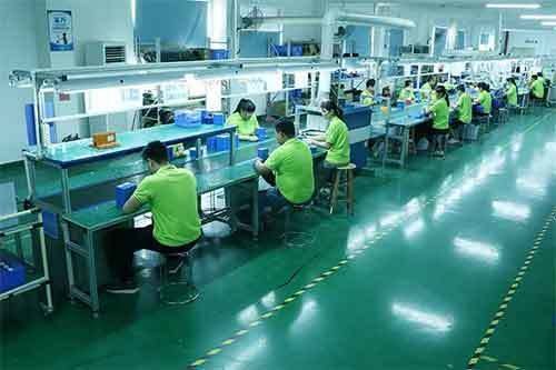 LiFePO4 battery assembly line workers at Solarens factory