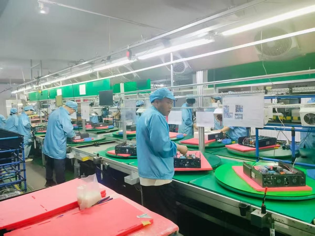 Solar inverter manufacturing plant workers at Solarens factory